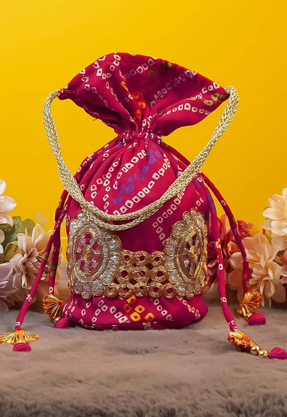 Bandhej Printed Crepe Potli Bag in Fuchsia