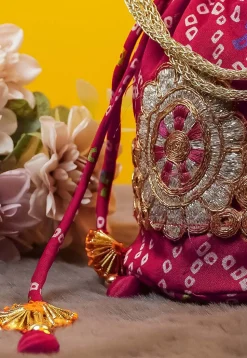 Bandhej Printed Crepe Potli Bag in Fuchsia