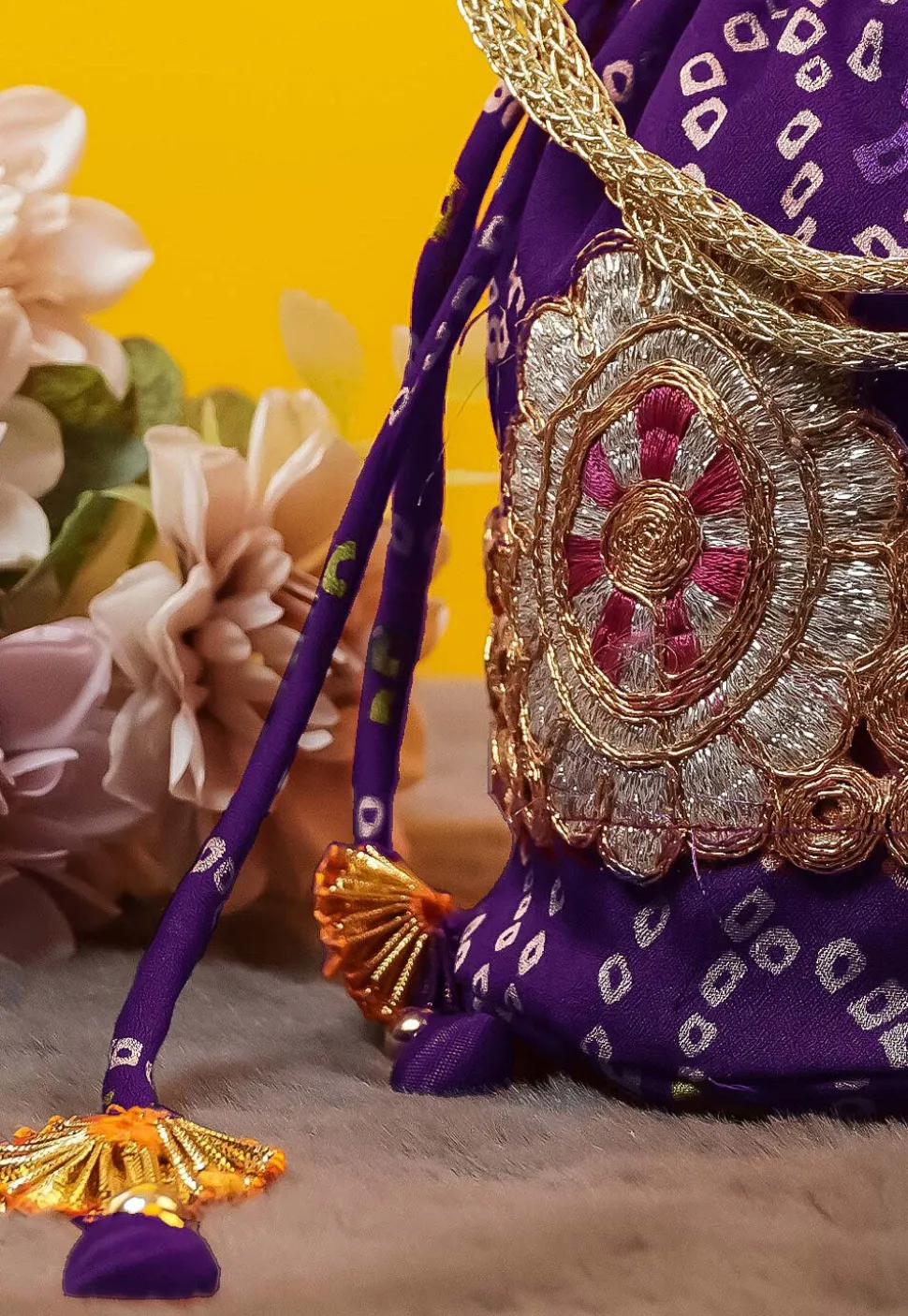 Bandhej Printed Crepe Potli Bag in Purple