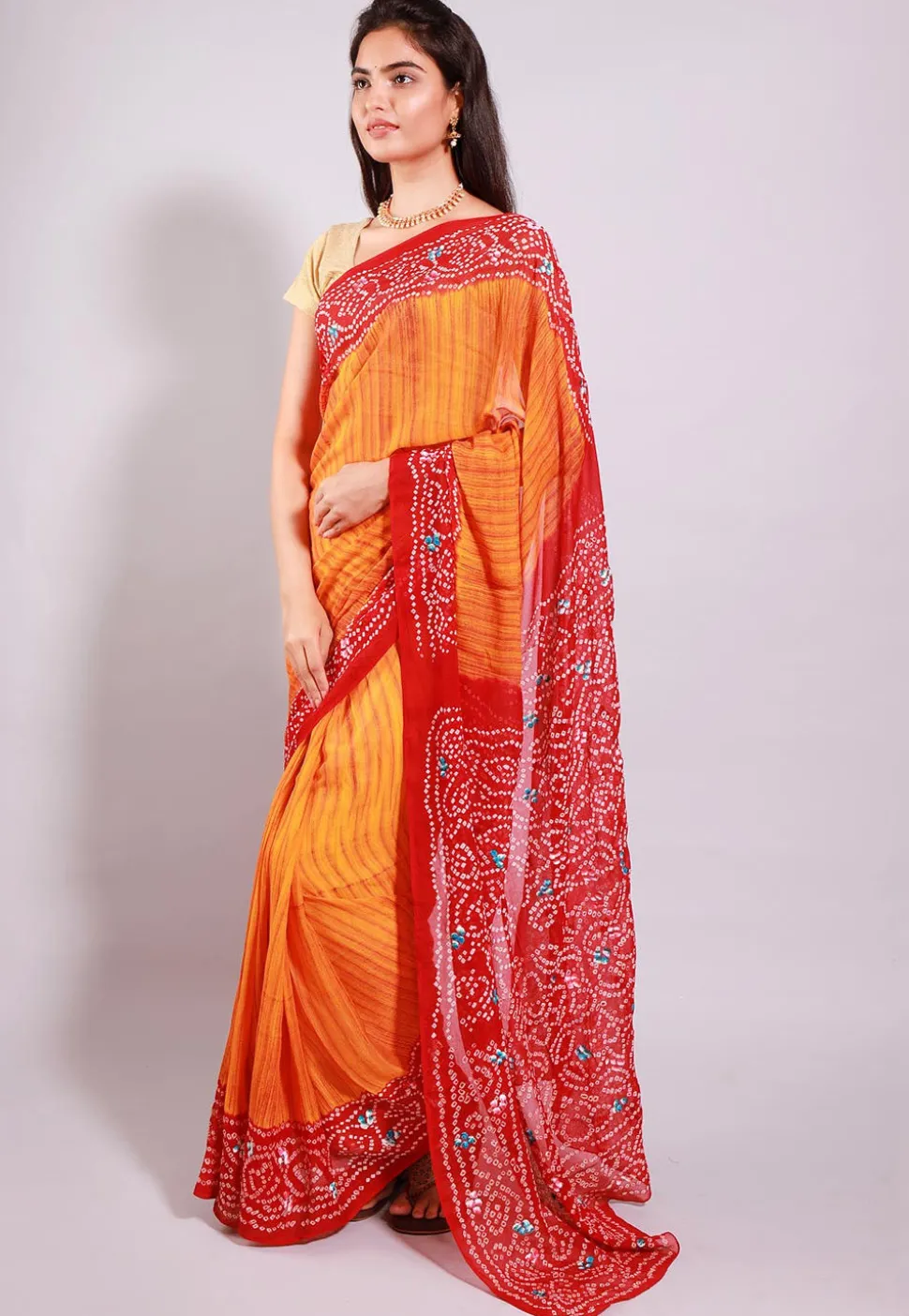 Bandhej Printed Pure Chinon Crepe Saree in Orange and Red