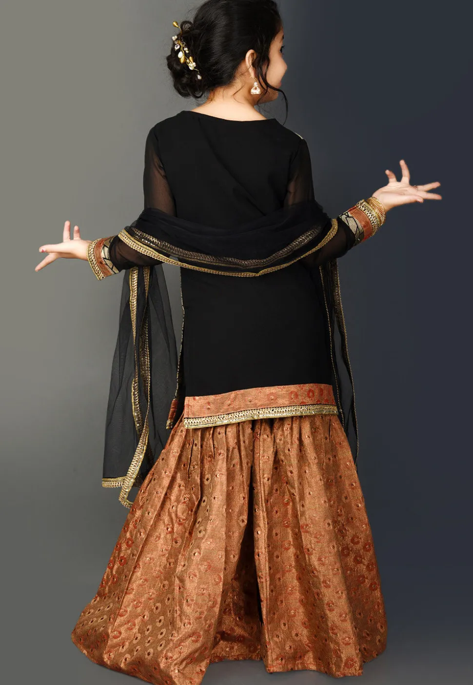 Brocade Pakistani Suit in Golden and Black