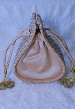 Embellished Art Silk Potli Bag in Peach