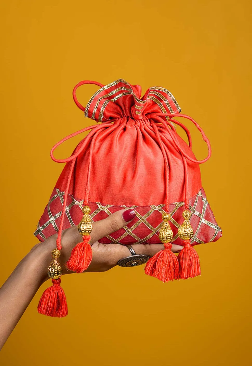 Embellished Art Silk Potli Bag in Orange