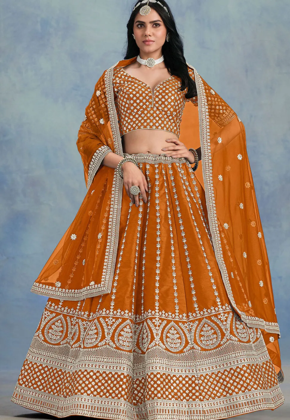 Embroidered Art Silk Lehenga in Orange