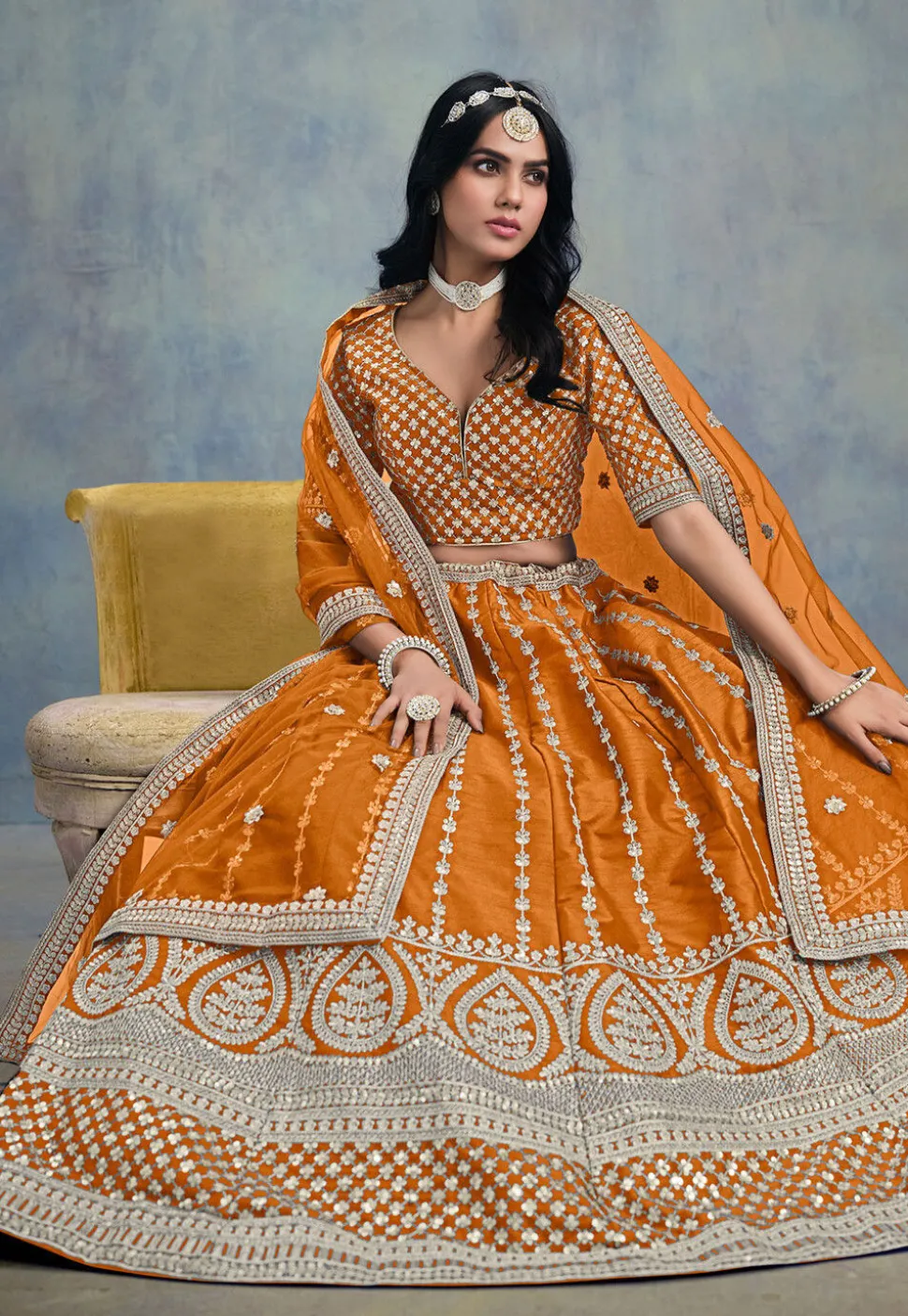 Embroidered Art Silk Lehenga in Orange