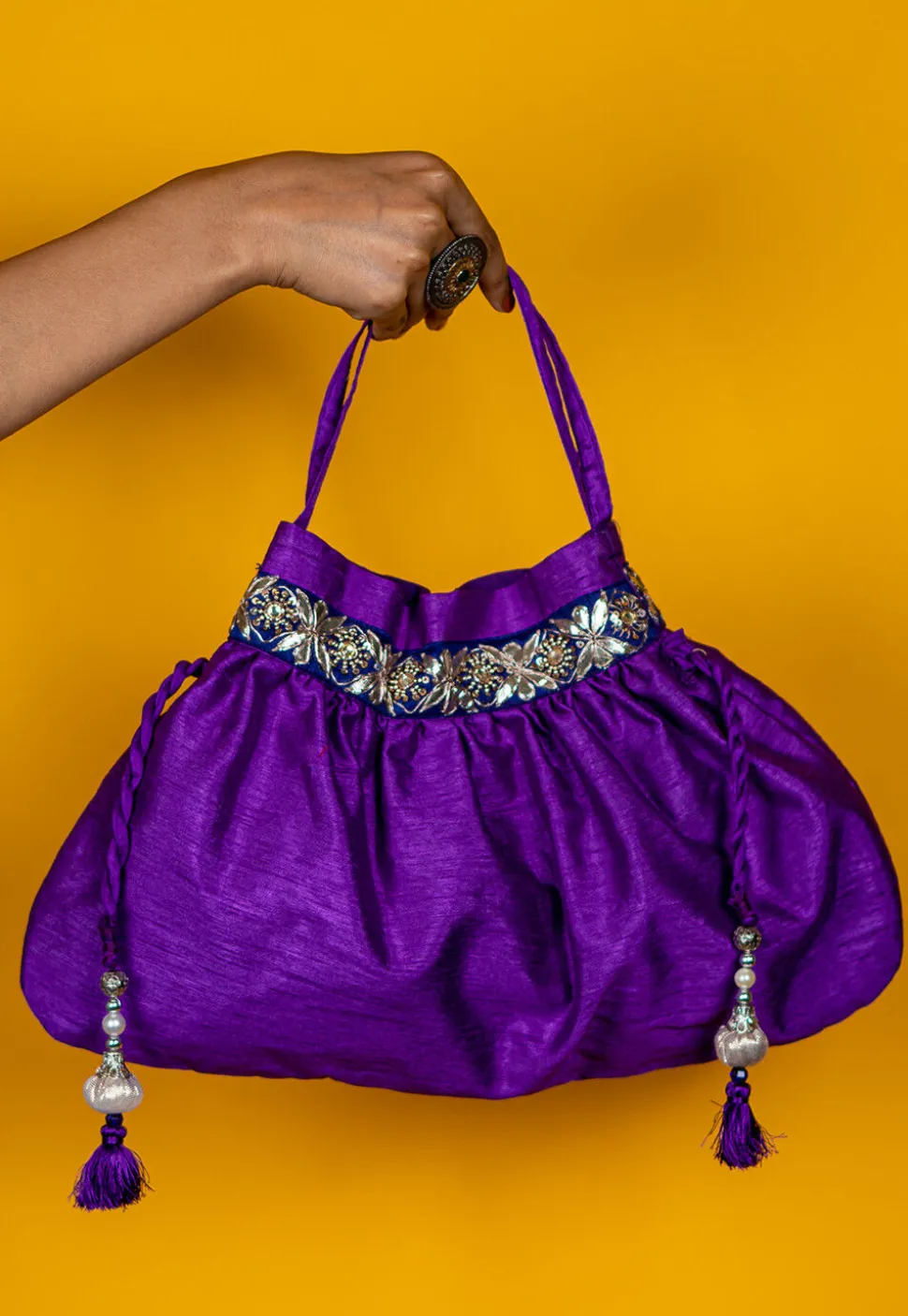 Embroidered Art Silk Potli Bag in Purple