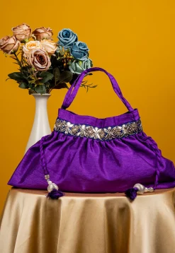 Embroidered Art Silk Potli Bag in Purple