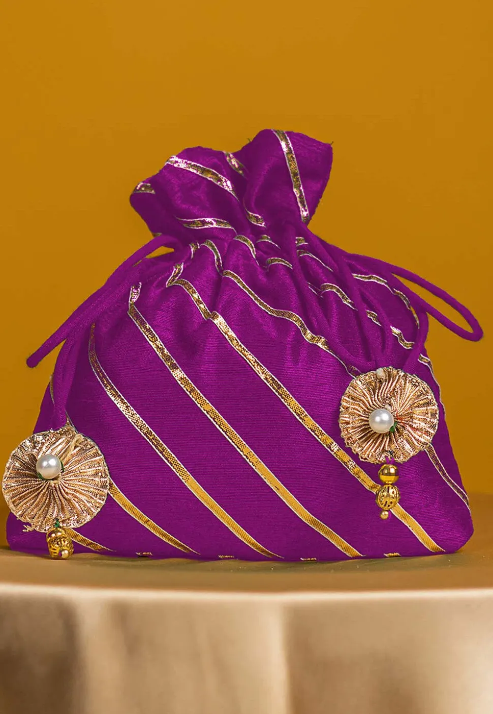 Embroidered Art Silk Potli Bag in Purple