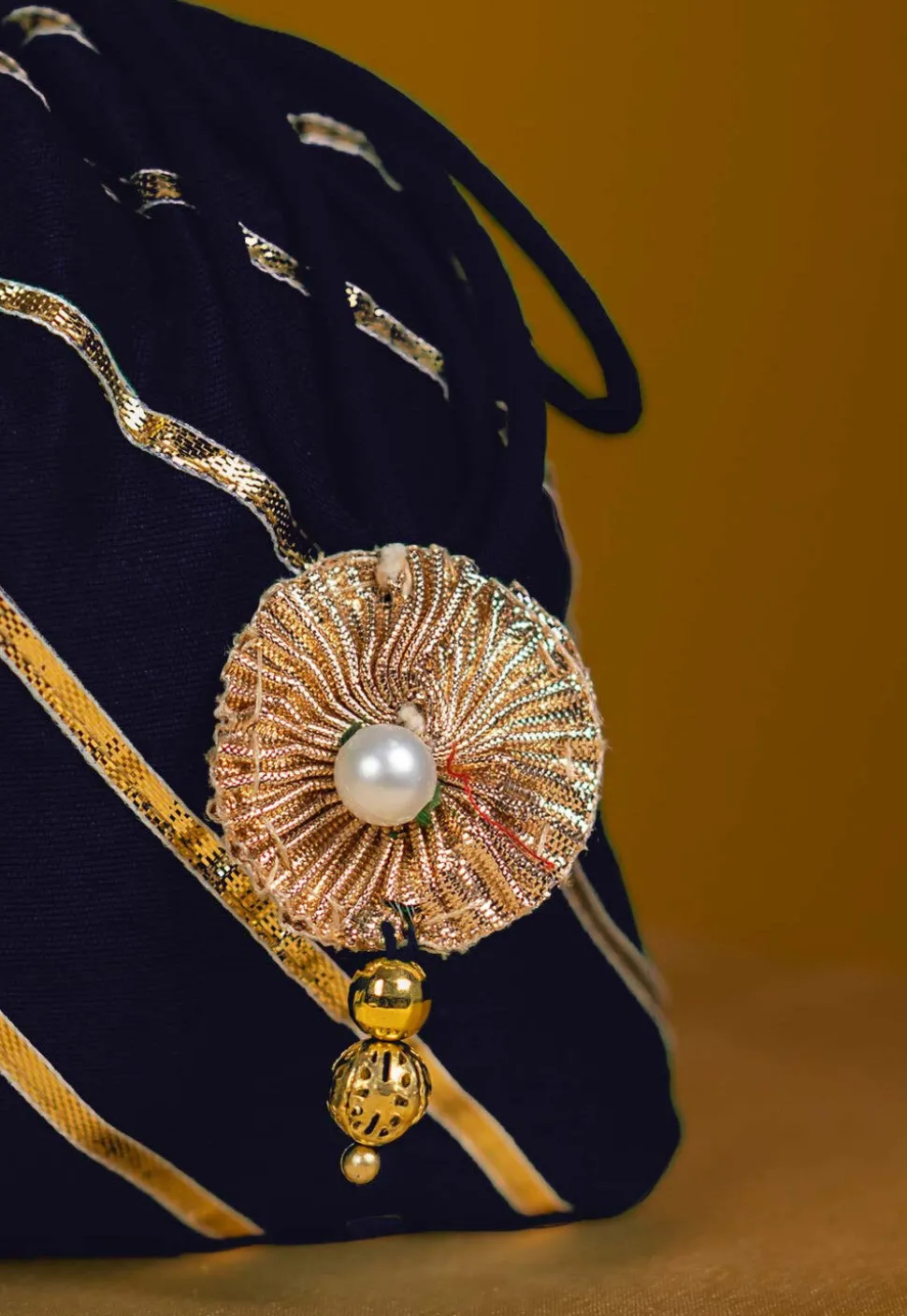 Embroidered Art Silk Potli Bag in Navy Blue