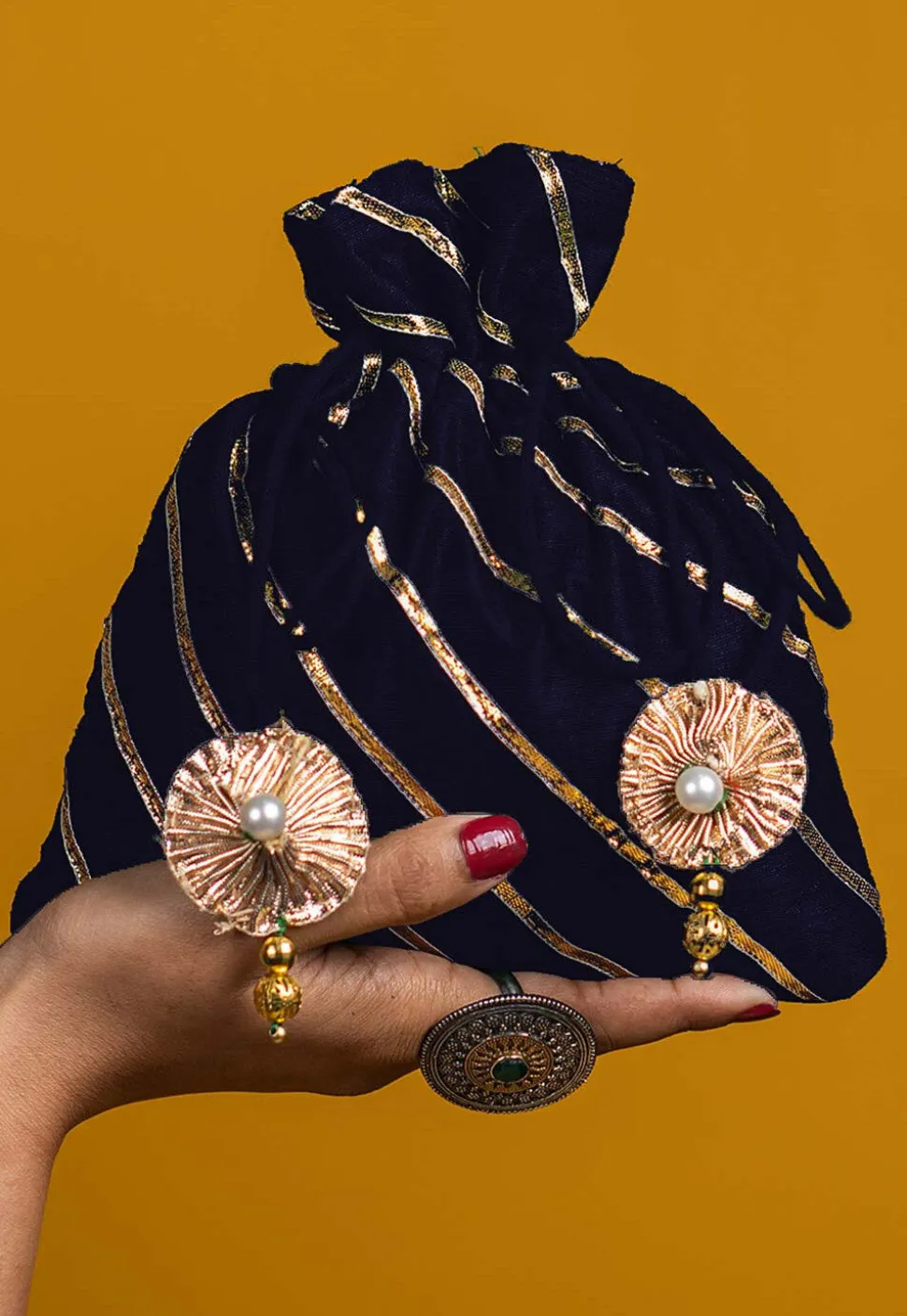 Embroidered Art Silk Potli Bag in Navy Blue