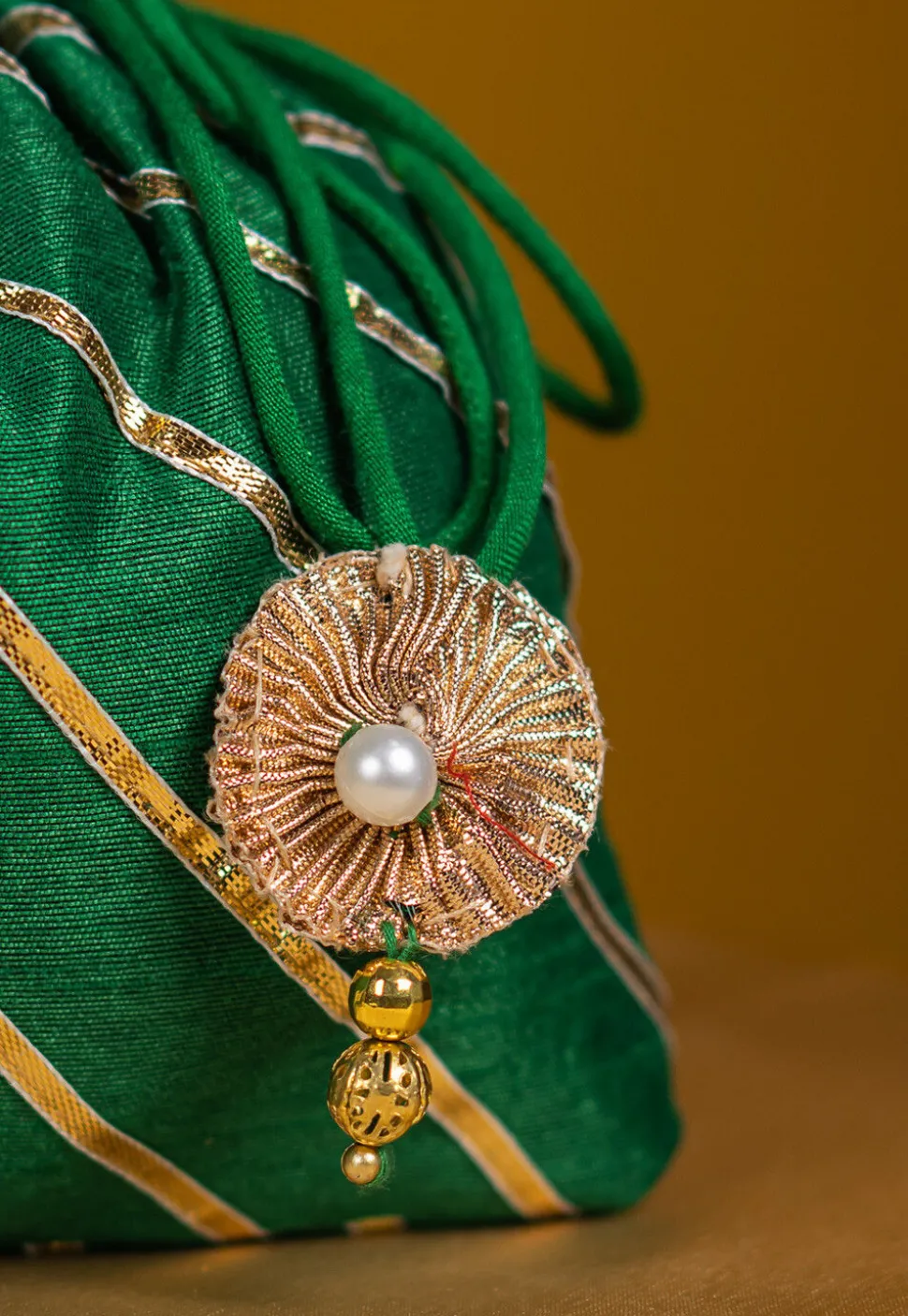 Embroidered Art Silk Potli Bag in Dark Green