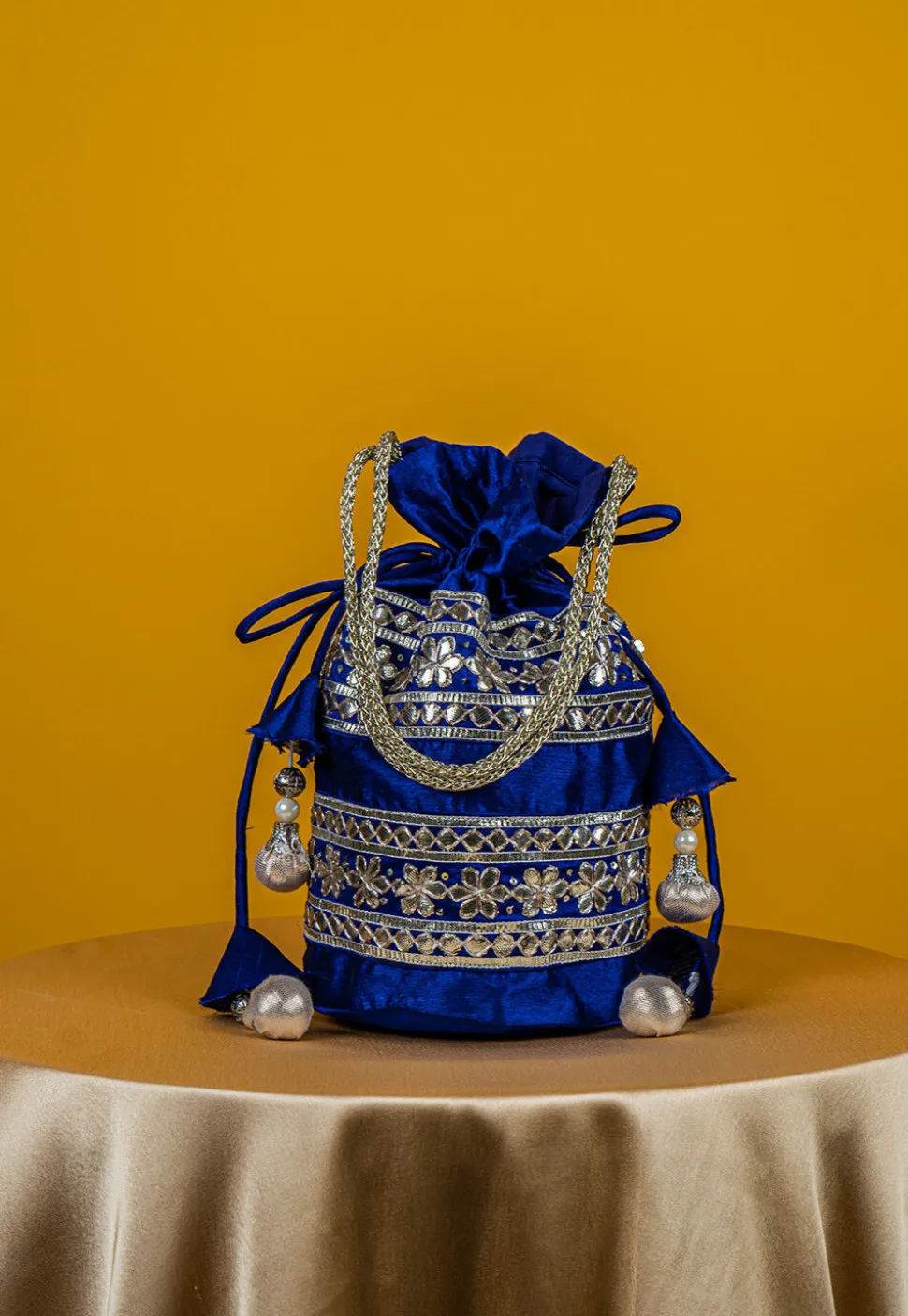 Embroidered Art Silk Potli Bag in Royal Blue