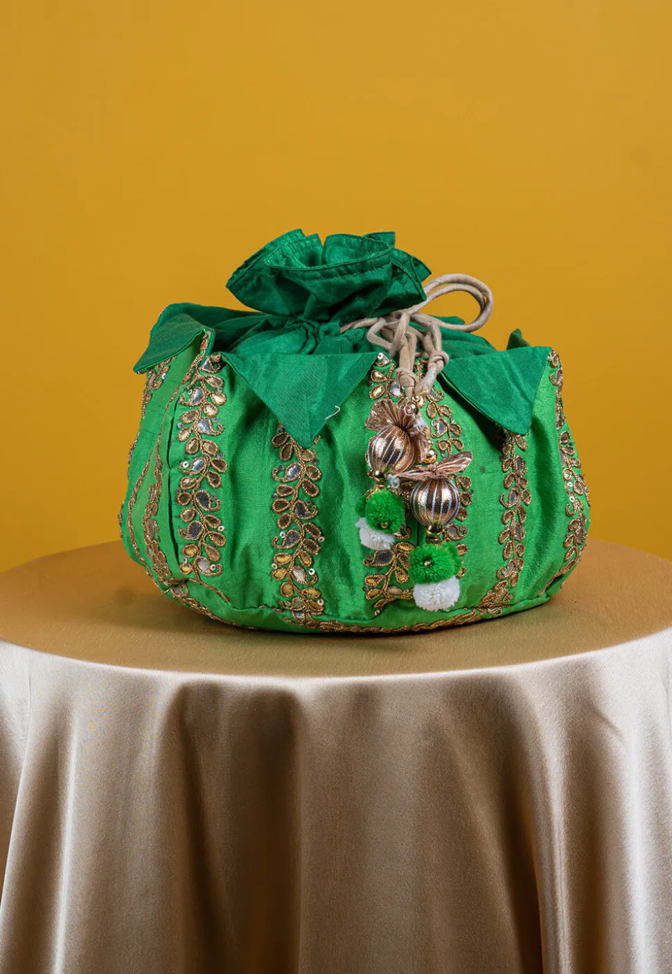 Embroidered Art Silk Potli Bag in Green