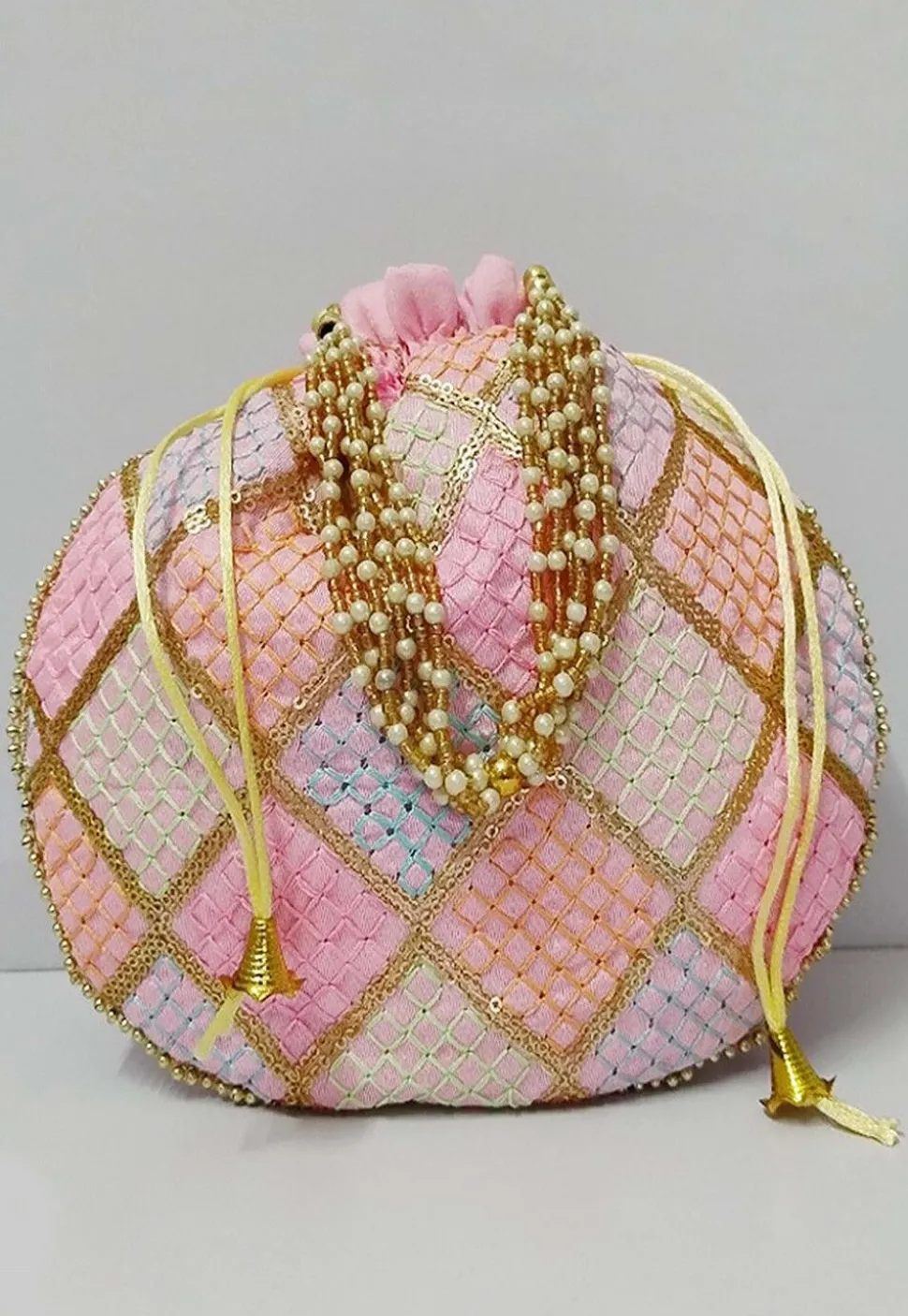 Embroidered Art Silk Potli Bag in Pink