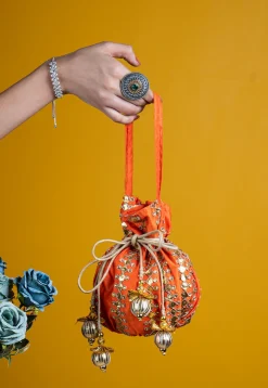 Embroidered Art Silk Potli Bag in Orange