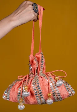 Embroidered Art Silk Potli Bag in Peach