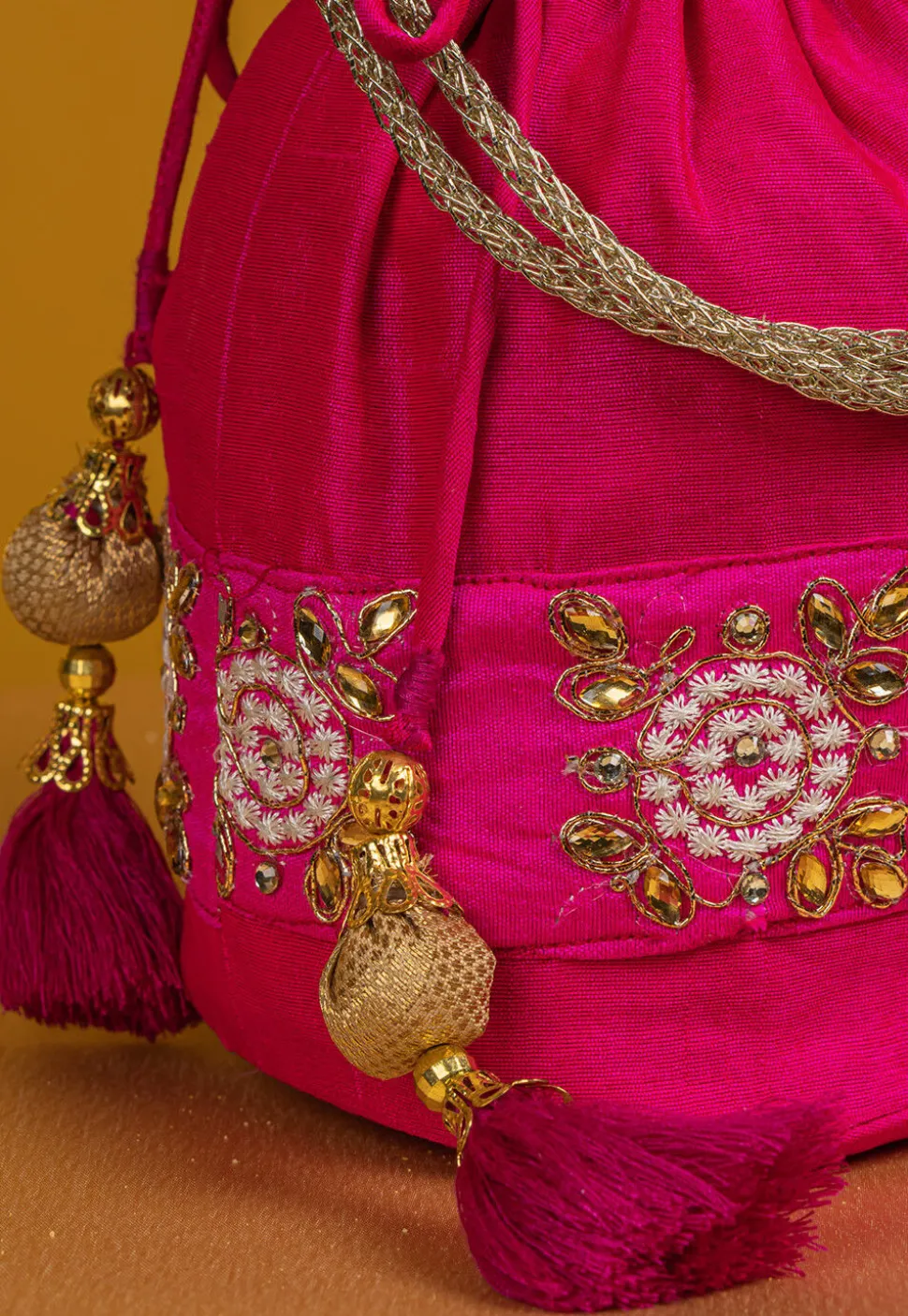 Embroidered Art Silk Potli Bag in Fuchsia
