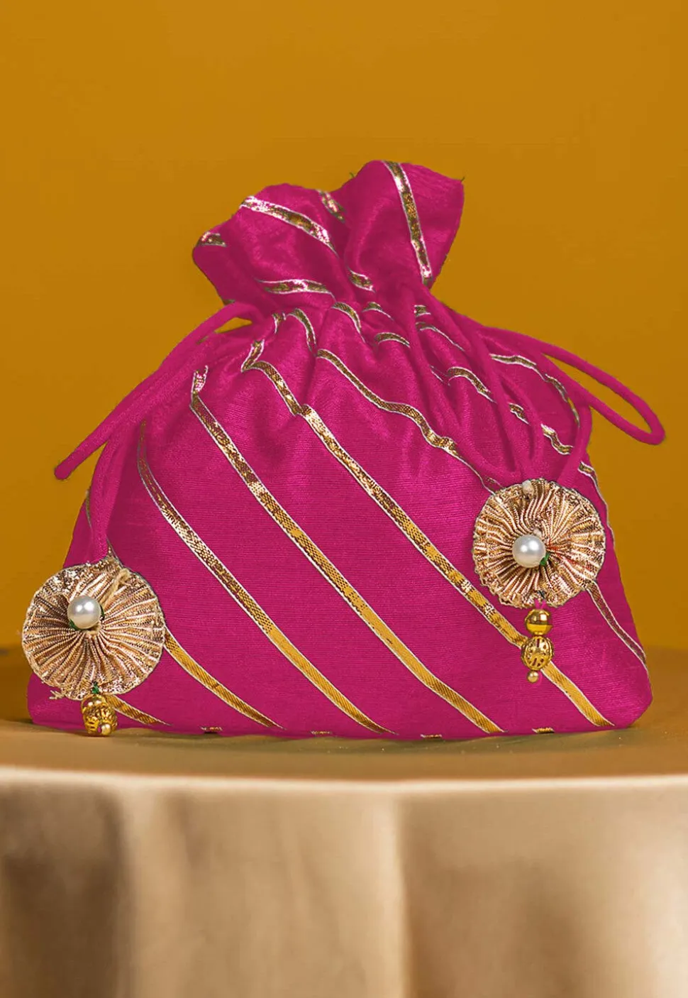 Embroidered Art Silk Potli Bag in Pink