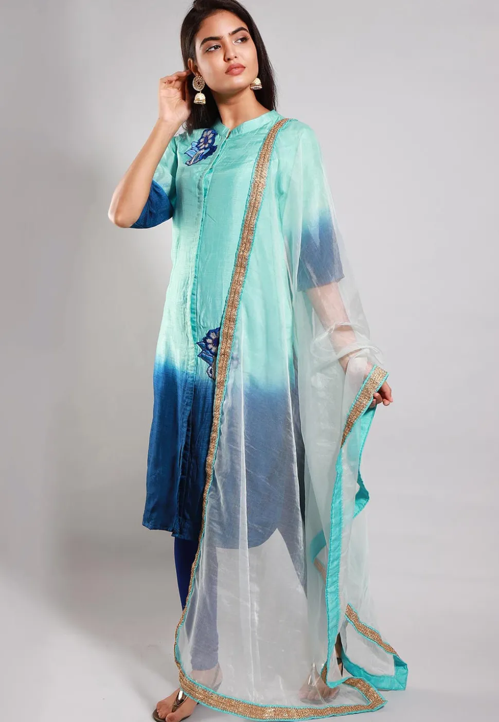 Embroidered Art Silk Straight Suit in Turquoise