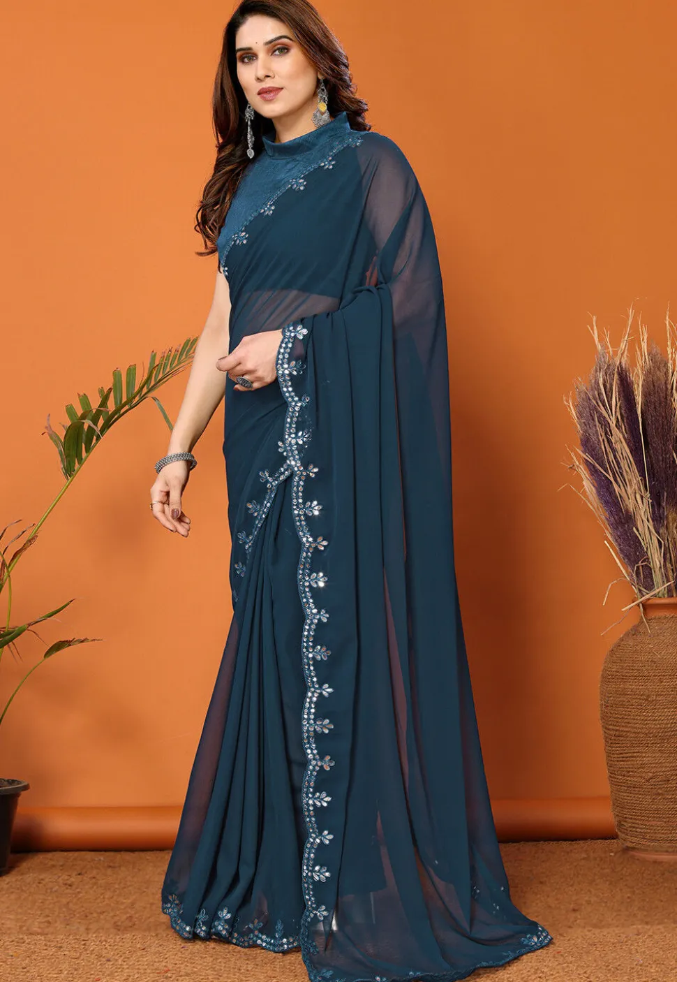 Embroidered Border Georgette Saree in Dark Teal Blue