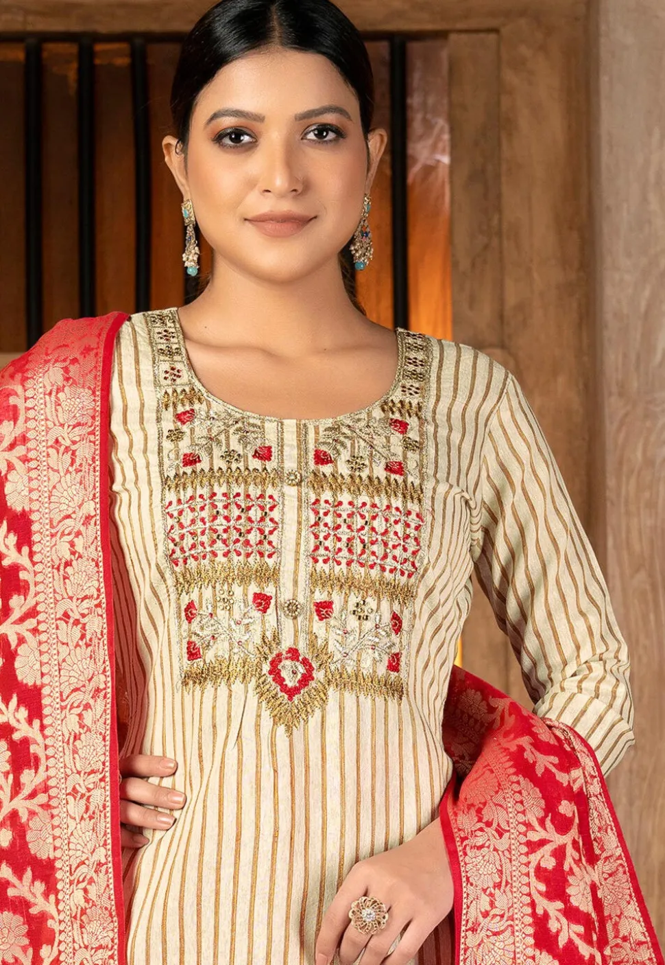 Embroidered Cambric Cotton Pakistani Suit in Beige