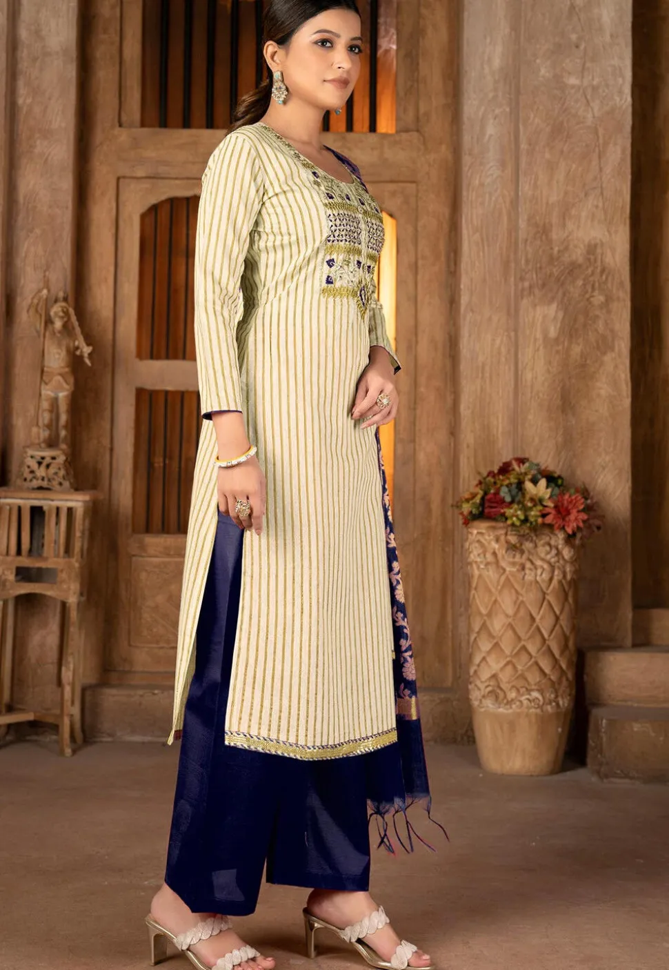 Embroidered Cambric Cotton Pakistani Suit in Beige