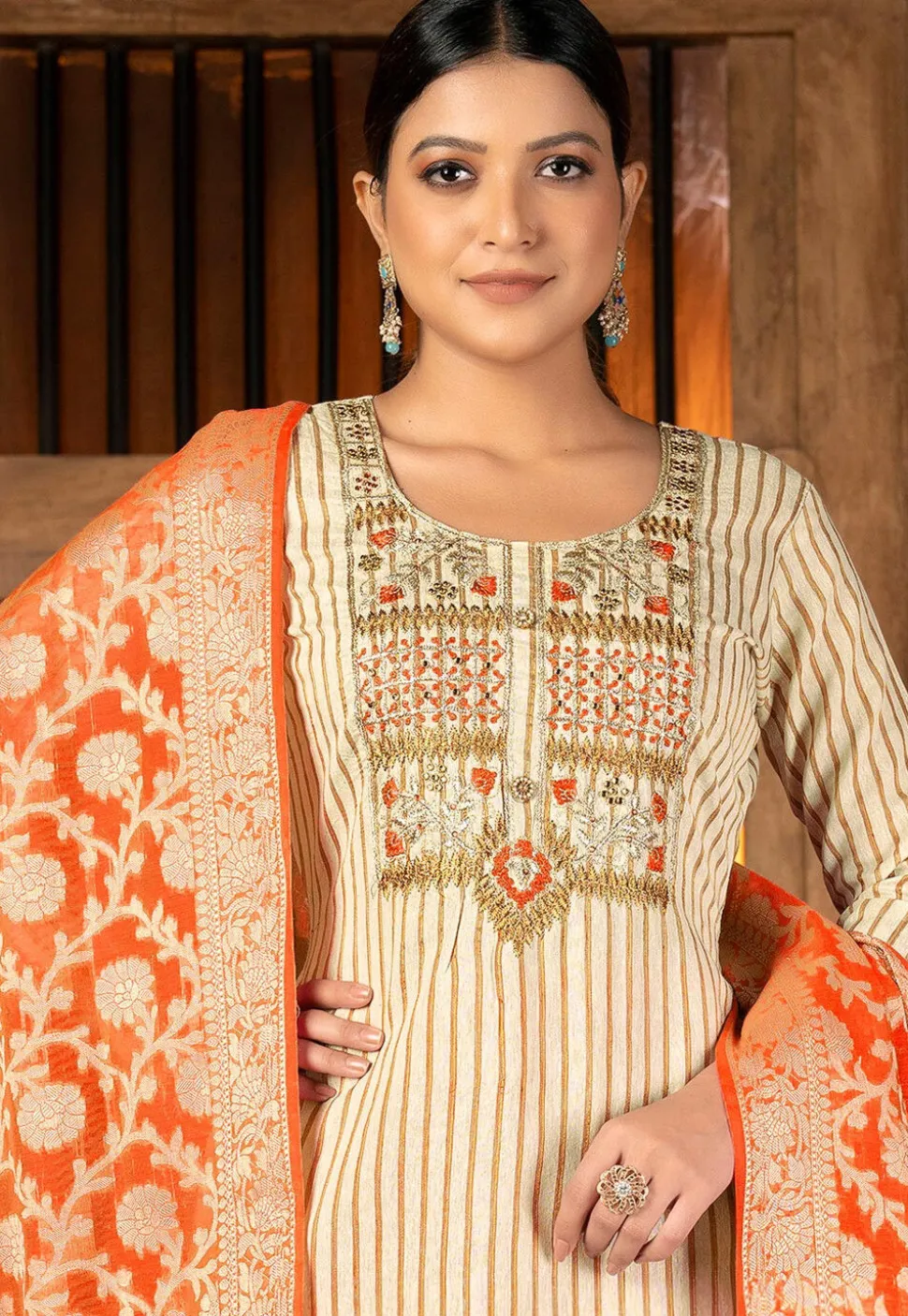 Embroidered Cambric Cotton Pakistani Suit in Beige