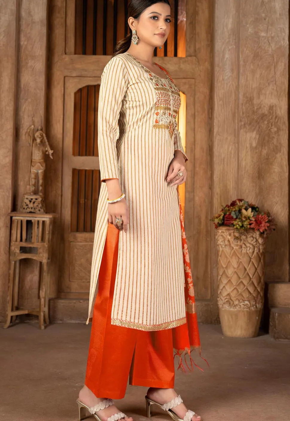 Embroidered Cambric Cotton Pakistani Suit in Beige