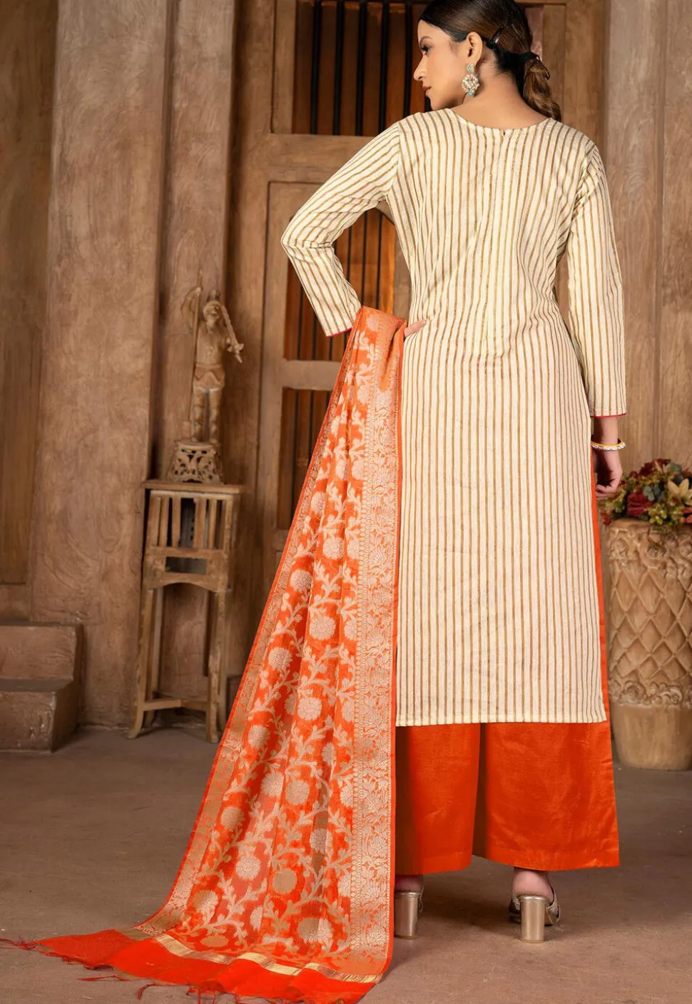 Embroidered Cambric Cotton Pakistani Suit in Beige