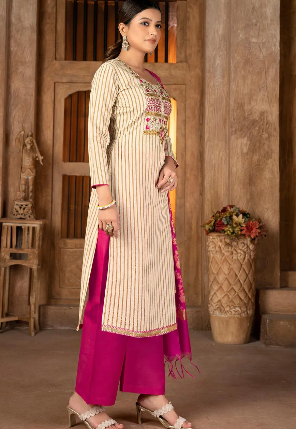 Embroidered Cambric Cotton Pakistani Suit in Beige