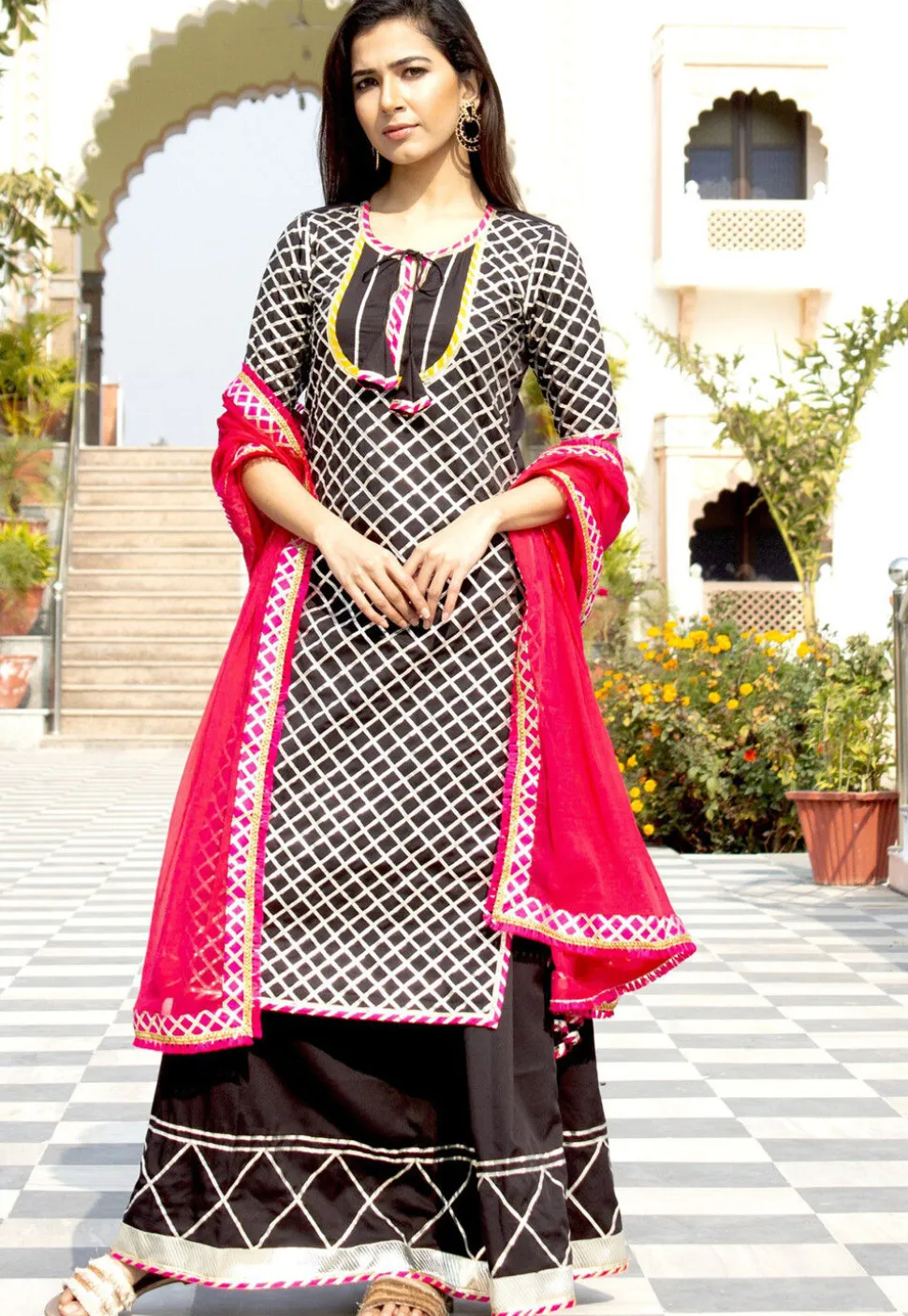 Embroidered Cotton Rayon Pakistani Suit in Black