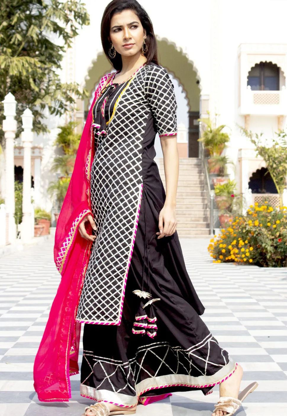 Embroidered Cotton Rayon Pakistani Suit in Black
