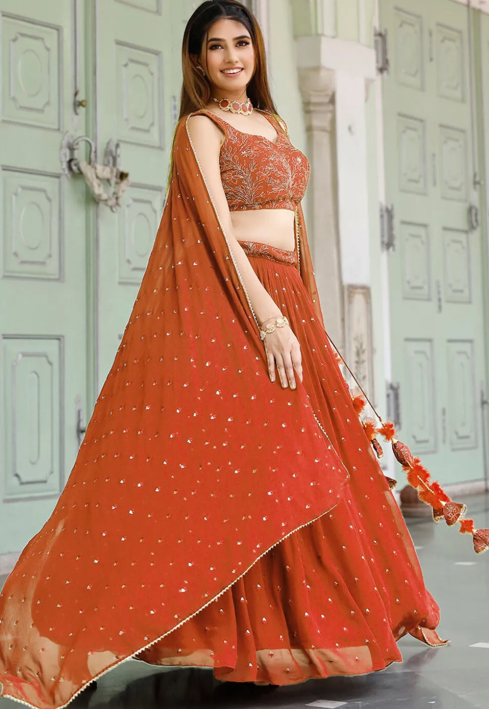 Embroidered Georgette Lehenga in Orange