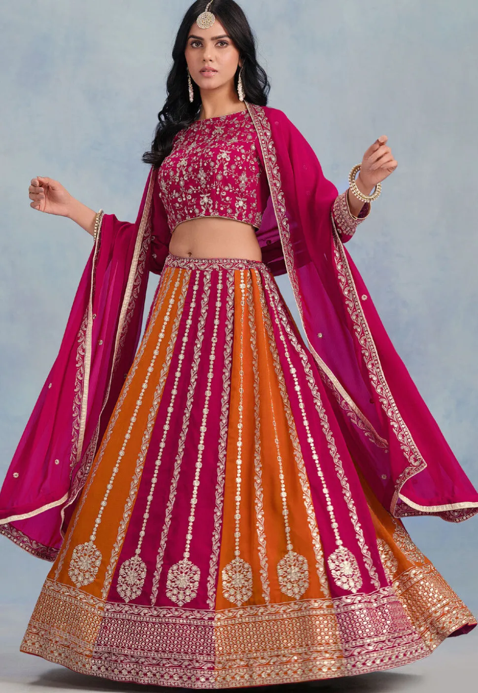 Embroidered Georgette Lehenga in Orange and Fuchsia