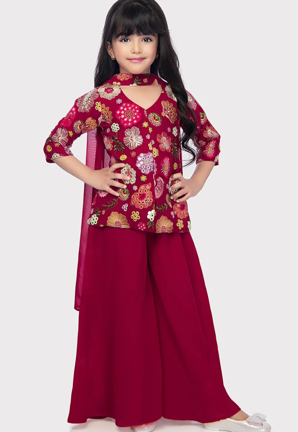 Embroidered Georgette Pakistani Suit in Dark Fuchsia