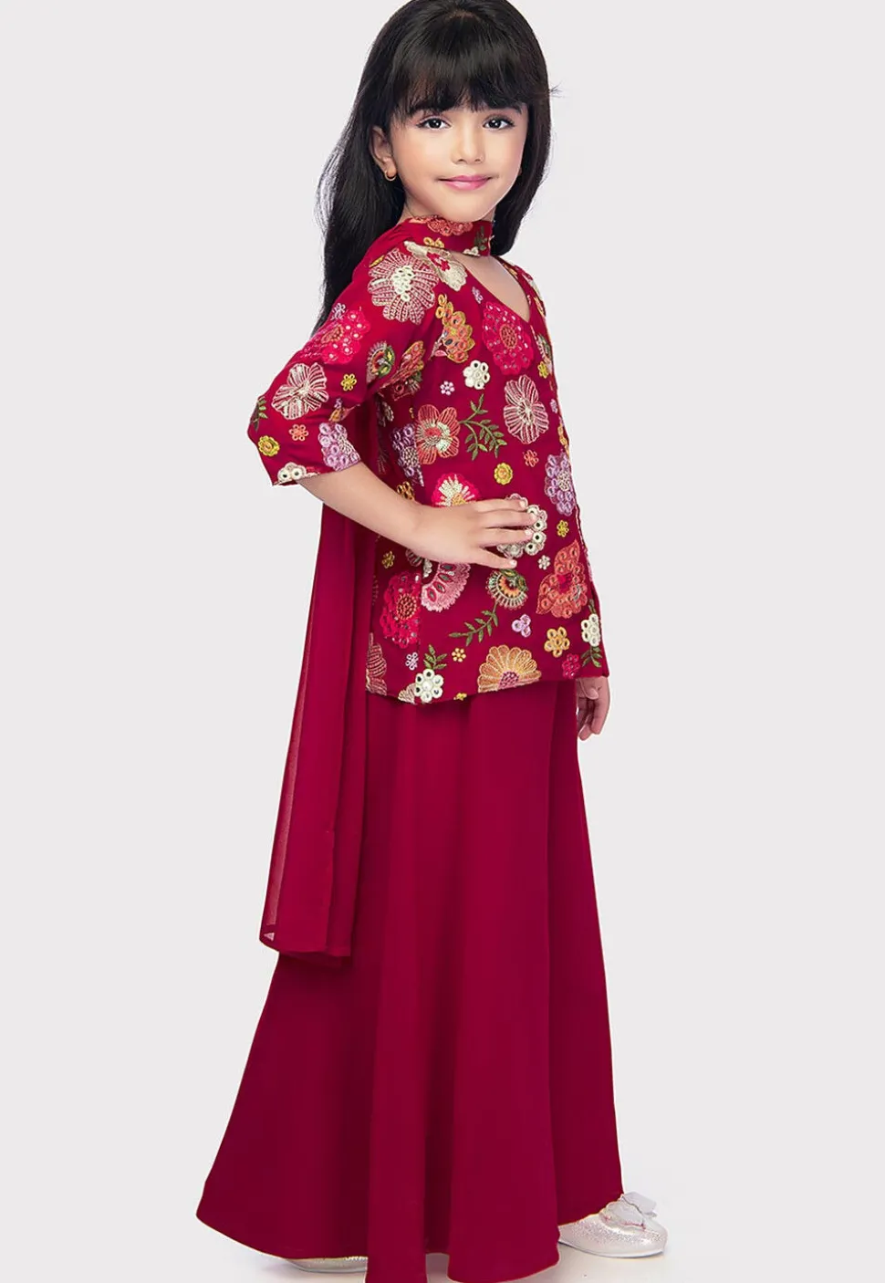 Embroidered Georgette Pakistani Suit in Dark Fuchsia