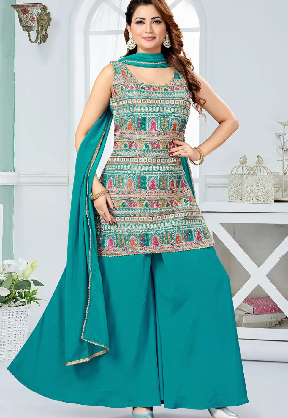 Embroidered Georgette Pakistani Suit in Teal Blue