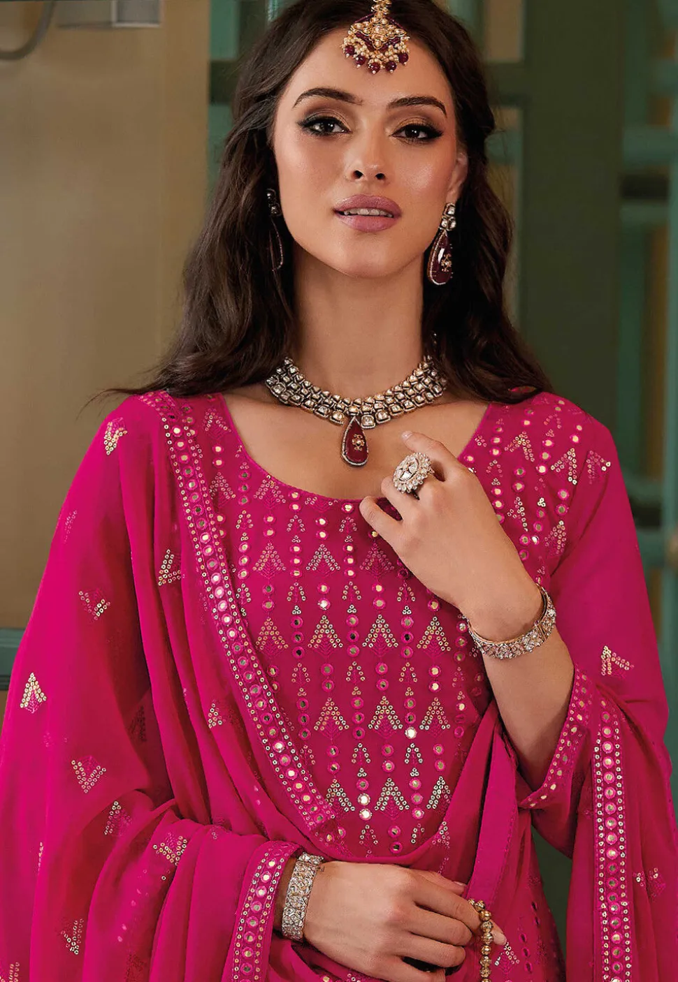 Embroidered Georgette Pakistani Suit in Fuchsia