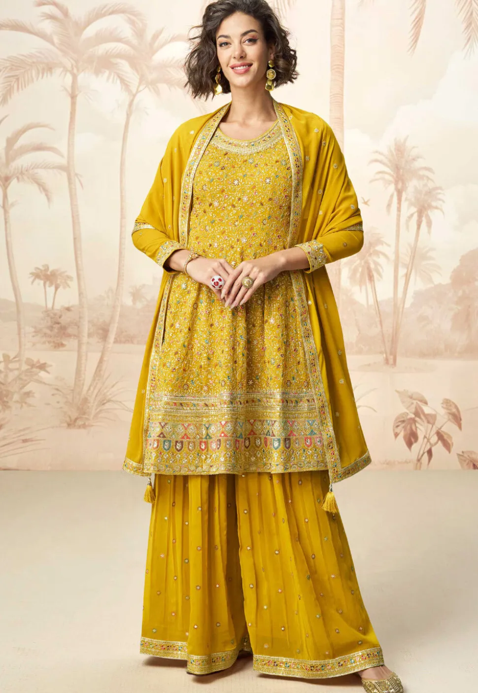Embroidered Georgette Pakistani Suit in Mustard