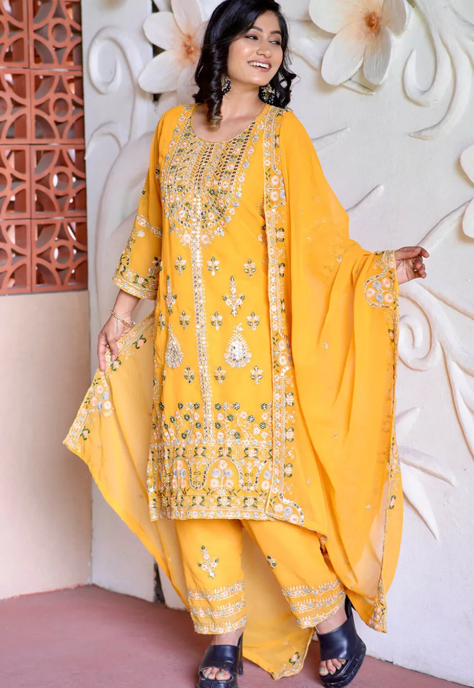 Embroidered Georgette Pakistani Suit in Yellow