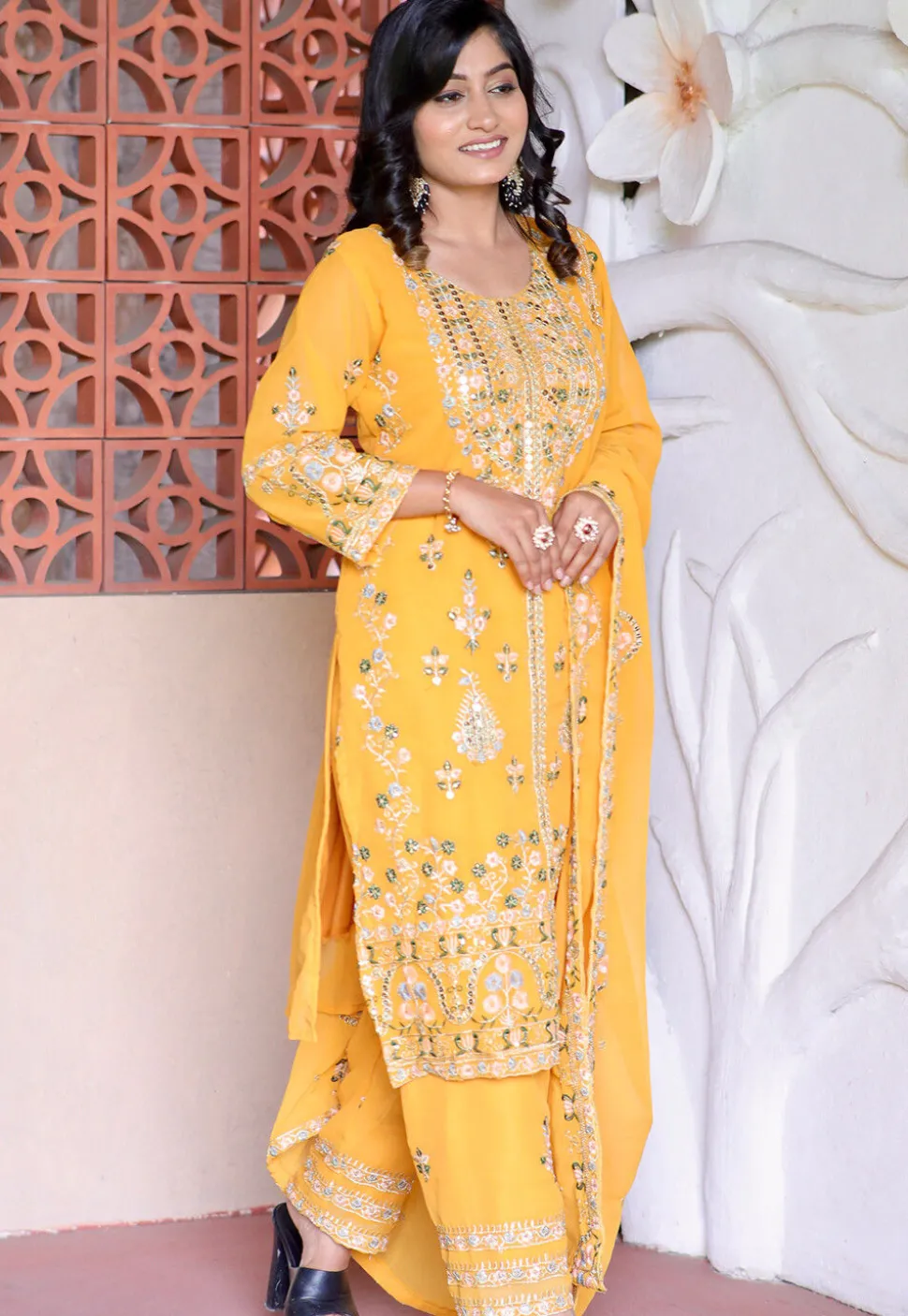 Embroidered Georgette Pakistani Suit in Yellow