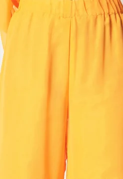Embroidered Georgette Pakistani Suit in Yellow