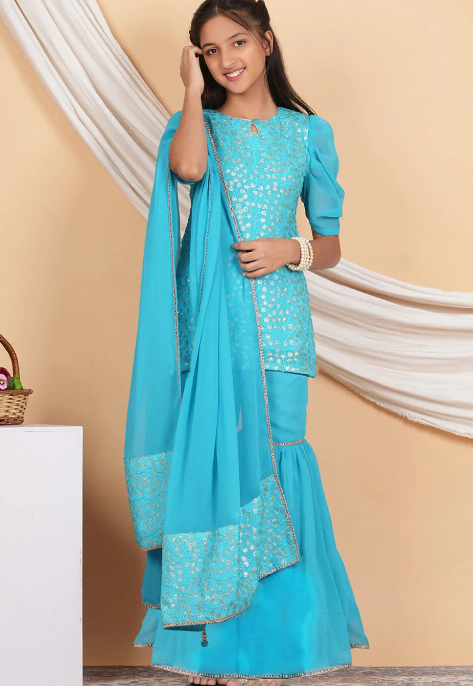 Embroidered Georgette Pakistani Suit in Turquoise
