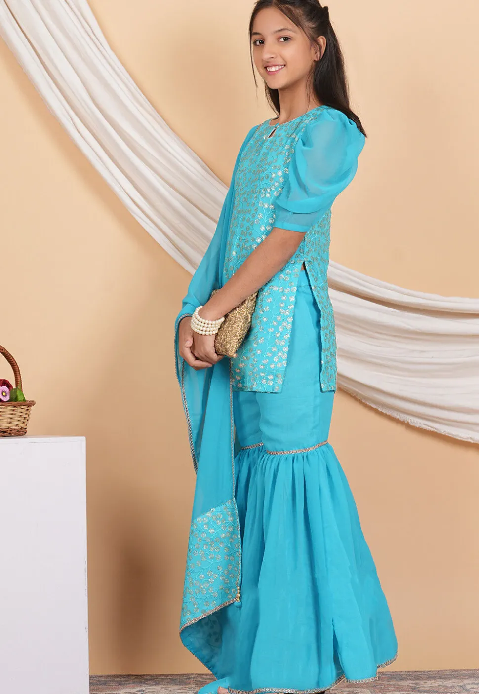 Embroidered Georgette Pakistani Suit in Turquoise