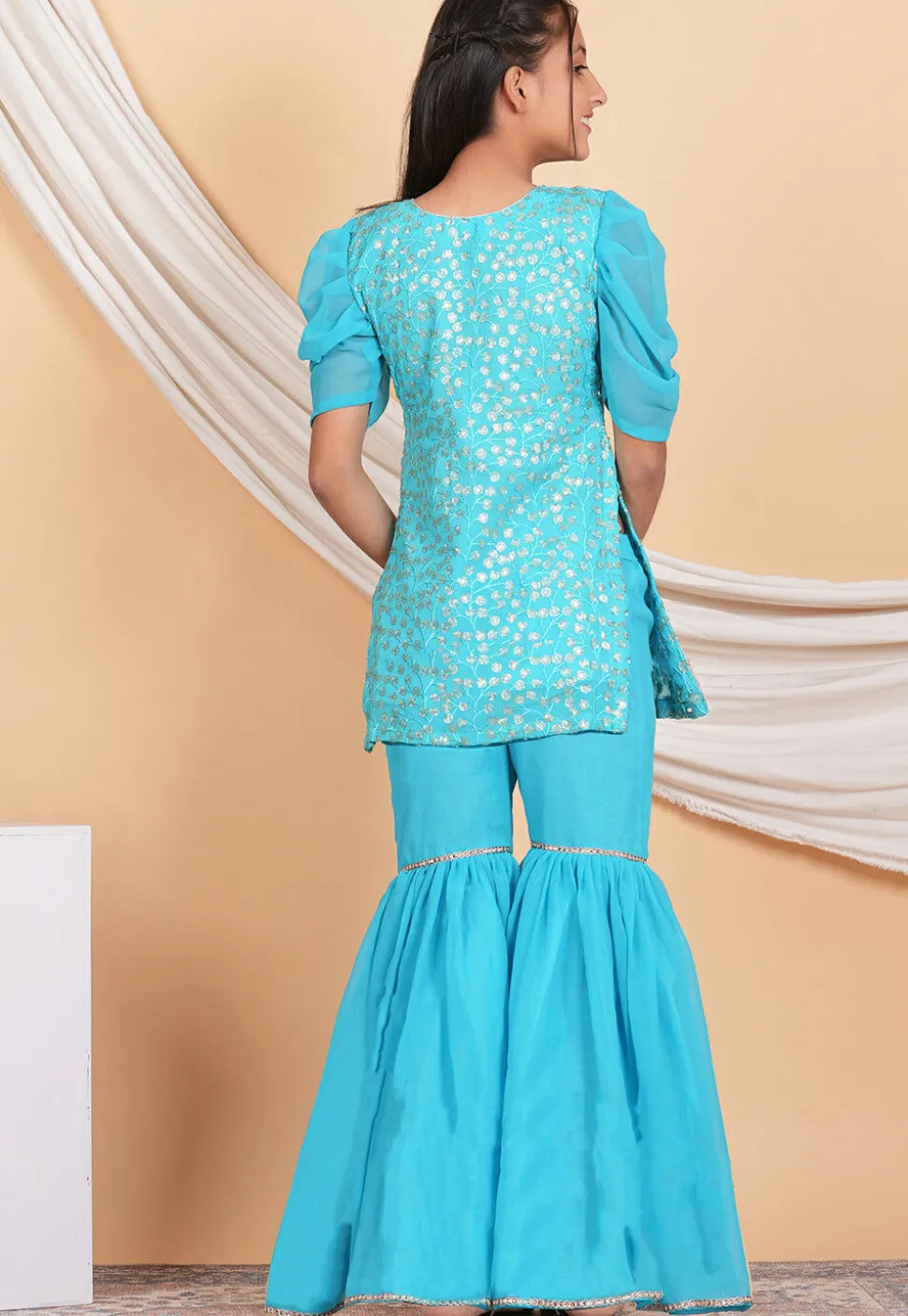 Embroidered Georgette Pakistani Suit in Turquoise