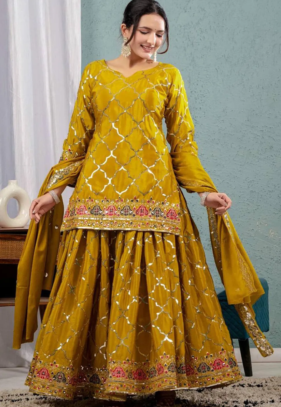 Embroidered Georgette Pakistani Suit in Mustard