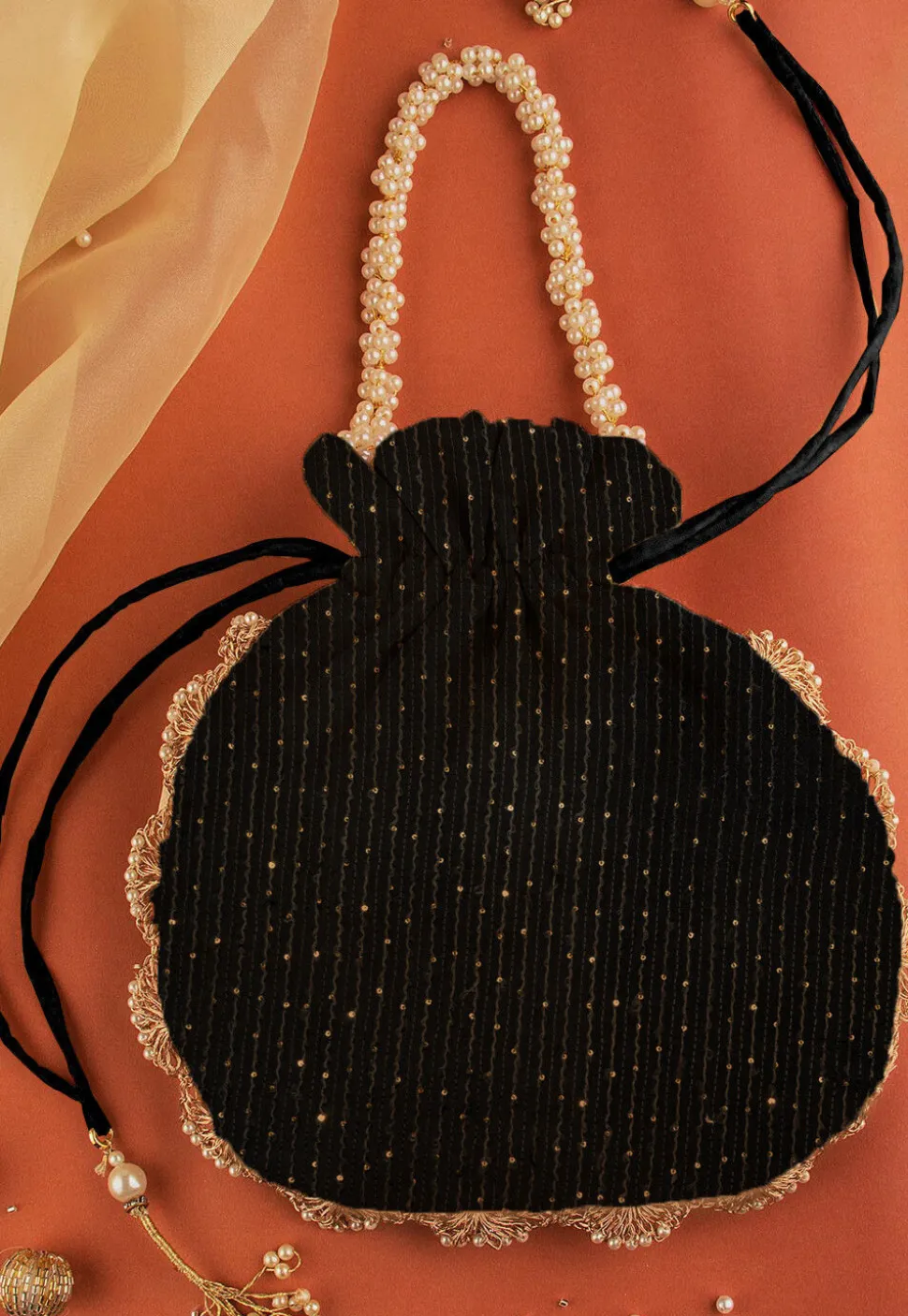 Embroidered Georgette Potli Bag in Black