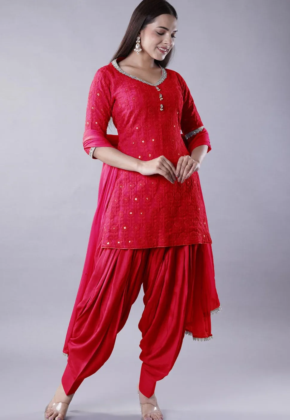Embroidered Georgette Punjabi Suit in Coral Red