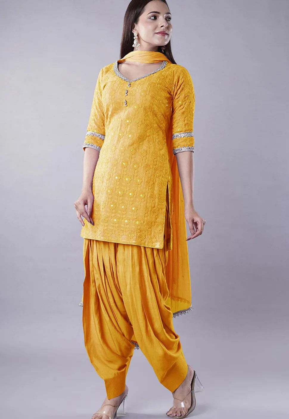 Embroidered Georgette Punjabi Suit in Mustard