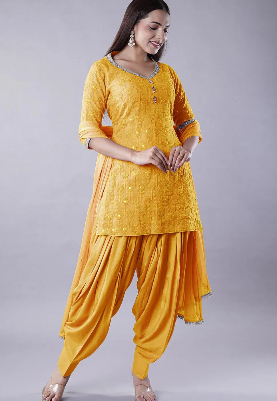 Embroidered Georgette Punjabi Suit in Mustard